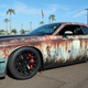 Illustration for article titled This Rust-Wrapped Dodge Challenger SRT Hellcat Is Making Me Have a True Existential Debate